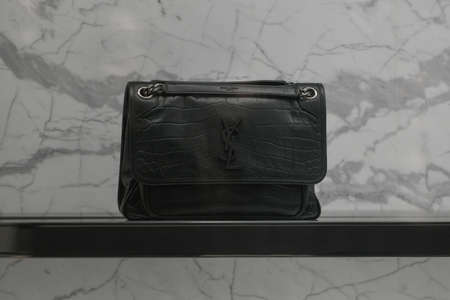 Milan, Italy - September 24, 2021: Valentino luxury and fashionable handbag from new collection 2022, close up store show caseのeditorial素材