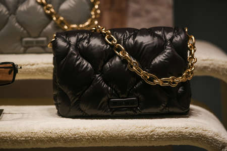 Milan, Italy - September 24, 2021: Valentino luxury and fashionable handbag from new collection 2022, close up store show caseのeditorial素材