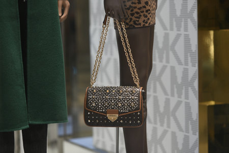 Milan, Italy - September 24, 2021: Chanel luxury and fashionable clothes and accessories from new collection 2022, close up store show caseのeditorial素材