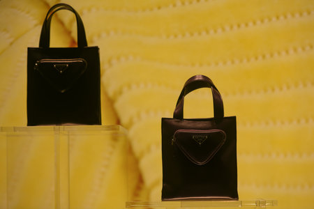 Milan, Italy - September 24, 2021: Chanel luxury and fashionable clothes and accessories from new collection 2022, close up store show caseのeditorial素材