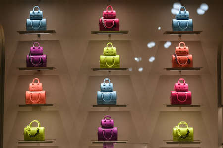 Milan, Italy - September 24, 2021: Chanel luxury and fashionable clothes and accessories from new collection 2022, close up store show caseのeditorial素材