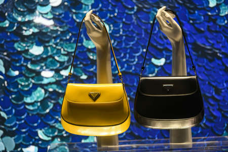 Milan, Italy - September 24, 2021: Balenciaga luxury and fashionable clothes and accessories from new collection 2022, close up store show caseのeditorial素材