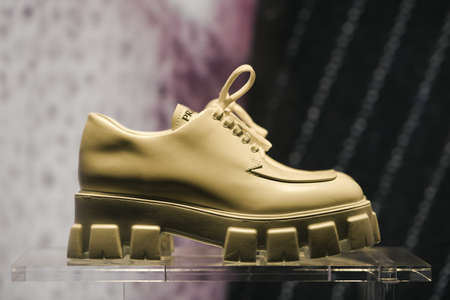 Milan, Italy - September 24, 2021: Balenciaga luxury and fashionable clothes and accessories from new collection 2022, close up store show caseのeditorial素材