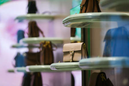 Milan, Italy - September 24, 2021: Balenciaga luxury and fashionable clothes and accessories from new collection 2022, close up store show caseのeditorial素材