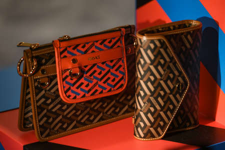 Milan, Italy - September 24, 2021: Miu Miu luxury and fashionable clothes and handbags from new collection 2022, close up store show caseのeditorial素材