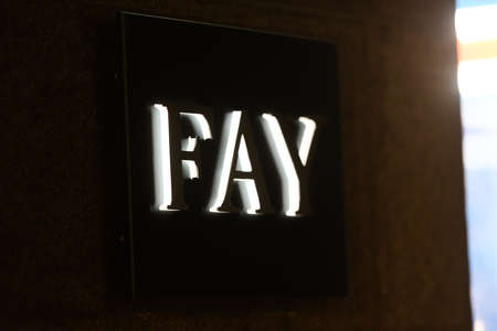 Milan, Italy - September 24, 2021: Fay  logo displayed on a facade of a store in Milan.