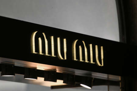 Milan, Italy - September 24, 2021: Miu Miu logo displayed on a facade of a store in Milan.のeditorial素材
