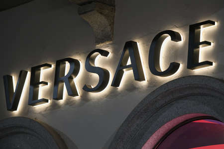 Milan, Italy - September 24, 2021: Versace logo displayed on a facade of a store in Milan.のeditorial素材