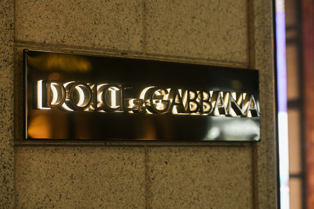 Milan, Italy - September 24, 2021: Dolce Gabbana logo displayed on a facade of a store in Milan.のeditorial素材