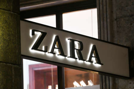 Milan, Italy - September 24, 2021: Zara logo displayed on a facade of a store in Milan.のeditorial素材