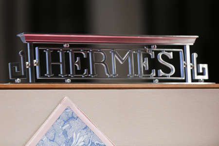 Milan, Italy - September 24, 2021: Hermes logo displayed on a facade of a store in Milan.のeditorial素材