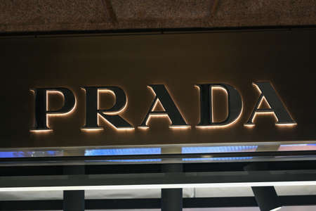 Milan, Italy - September 24, 2021: Prada logo displayed on a facade of a store in Milan.のeditorial素材