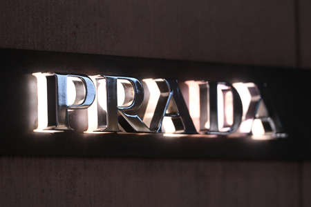 Milan, Italy - September 24, 2021: Prada logo displayed on a facade of a store in Milan.のeditorial素材