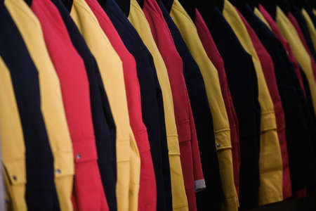 Milan, Italy - September 24, 2021: Women clothes on racks in a boutique store.のeditorial素材