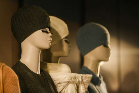 Milan, Italy - September 24, 2021: Mannequins standing in a window display of a clothing store.のeditorial素材