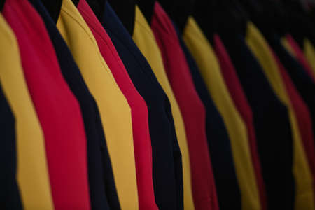 Milan, Italy - September 24, 2021: Women clothes on racks in a boutique store.のeditorial素材