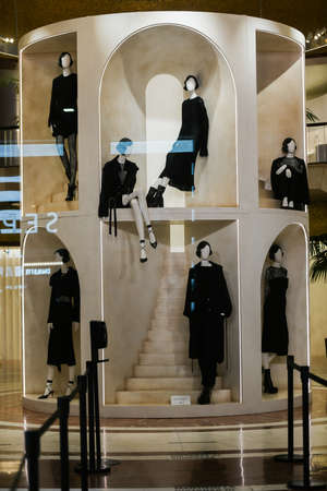 Milan, Italy - September 24, 2021: Mannequins standing in a window display of a clothing store.のeditorial素材