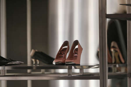 Milan, Italy - September 24, 2021: Luxury women shoes in a store.のeditorial素材