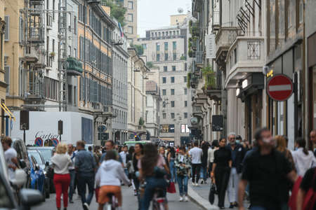Milan, Italy - September 24, 2021: People walking in busy downtown city center of Milan.のeditorial素材