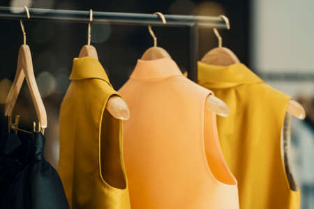 shopping concept - colorful clothing in a fancy storeの写真素材