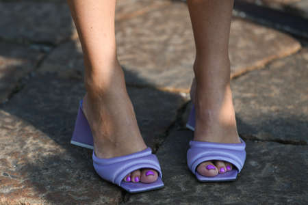 fashionable woman wearing blue shoesの写真素材