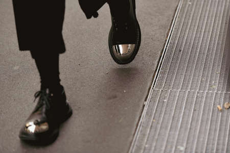 Street style outfit - shiny shoes and black pants