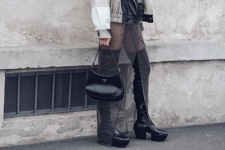 Milan, Italy - February, 24: Street style, woman wearing Prada outfit.のeditorial素材