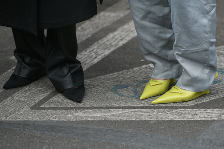 Milan, Italy - February 25, 2022: Street style, woman wearing fashionable outfit.のeditorial素材