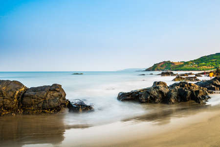 Rocks at Vagator beach, Goa in long exposureの写真素材