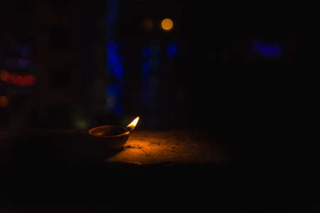 Diwali light using traditional diwa made of earth soil in bokehの写真素材