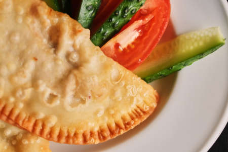 plate cheburek vegitables dinner national delicious meal top viewの写真素材
