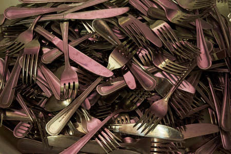 many cutlery spoon knife fork close up photoの写真素材