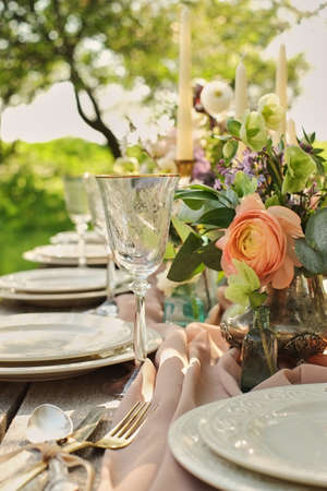 decor wedding dinner in nature in the garden