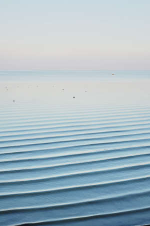 Blue sky landscape without clouds spreading on the sea in the late winter