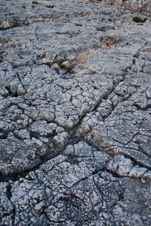 Rocky coast with sharp stone rowsの写真素材