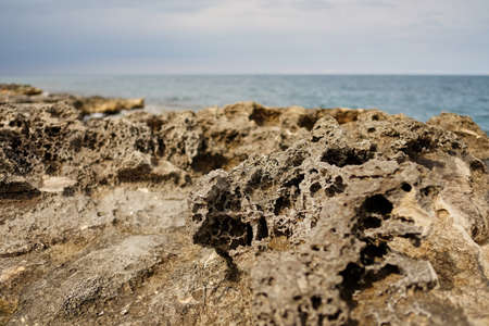 typical red and orange seascape in Mediterranean sea cliffsの写真素材