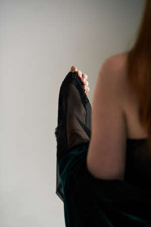 Bride looks out the window concept photo