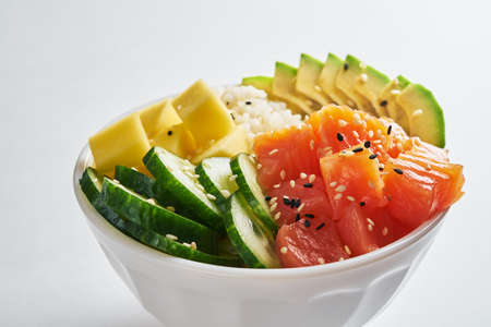 poke bowl with salmon islated on white background. side viewの写真素材