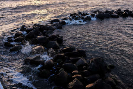 Sunset Seascape. Beautiful sunset with natural coastal cliffs.の写真素材