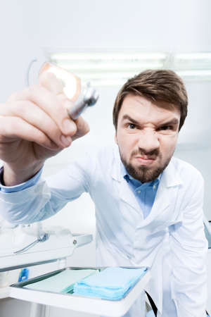 Dentist is ready for treating carious teethの写真素材