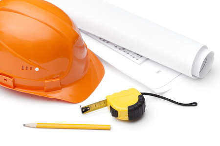 Orange hard hat, druft, pencil and tape measure, isolated on white