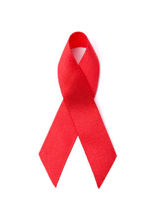 Red ribbon is symbol of aids awareness, isolated on white