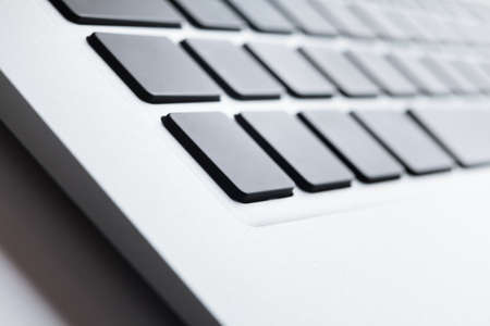 Close up view of a keyboard with dark buttons