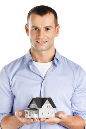 Realtor hands small model house, isolated on whiteの写真素材