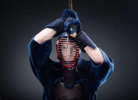 Portrait of kendoka with shinai. Japanese martial art of sword fightingの写真素材