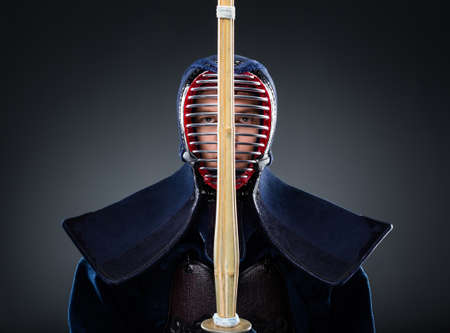 Kendoka keeps the shinai in front of the face. Japanese martial art of sword fightingの写真素材