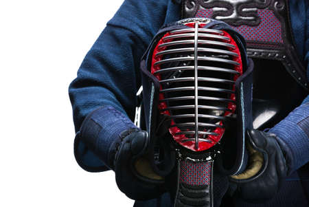 Close up of kendo men in hands of kendoka, isolated on white. Japanese martial art of sword fightingの写真素材