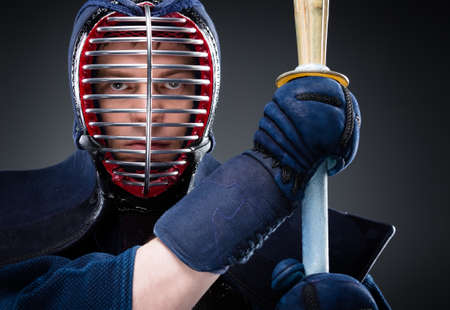 Close up of kendo fighter with shinai  Japanese martial art of sword fightingの写真素材