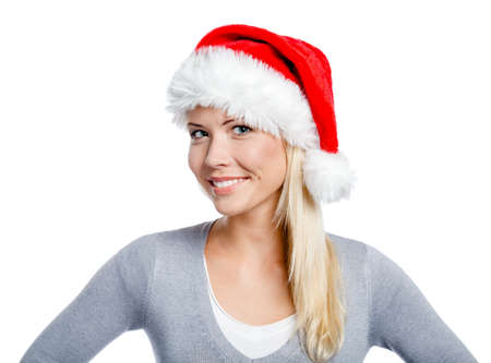 Portrait of woman in Santa's hat, isolated on white