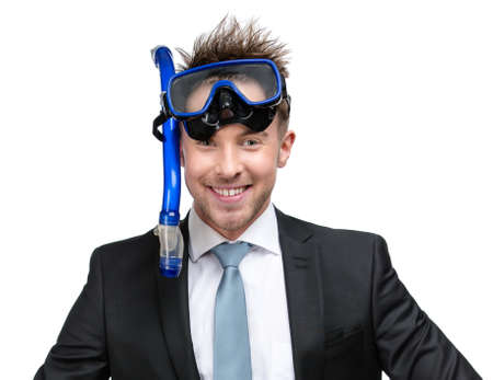 Businessman wearing suit and goggles with snorkel, isolated on whiteの写真素材
